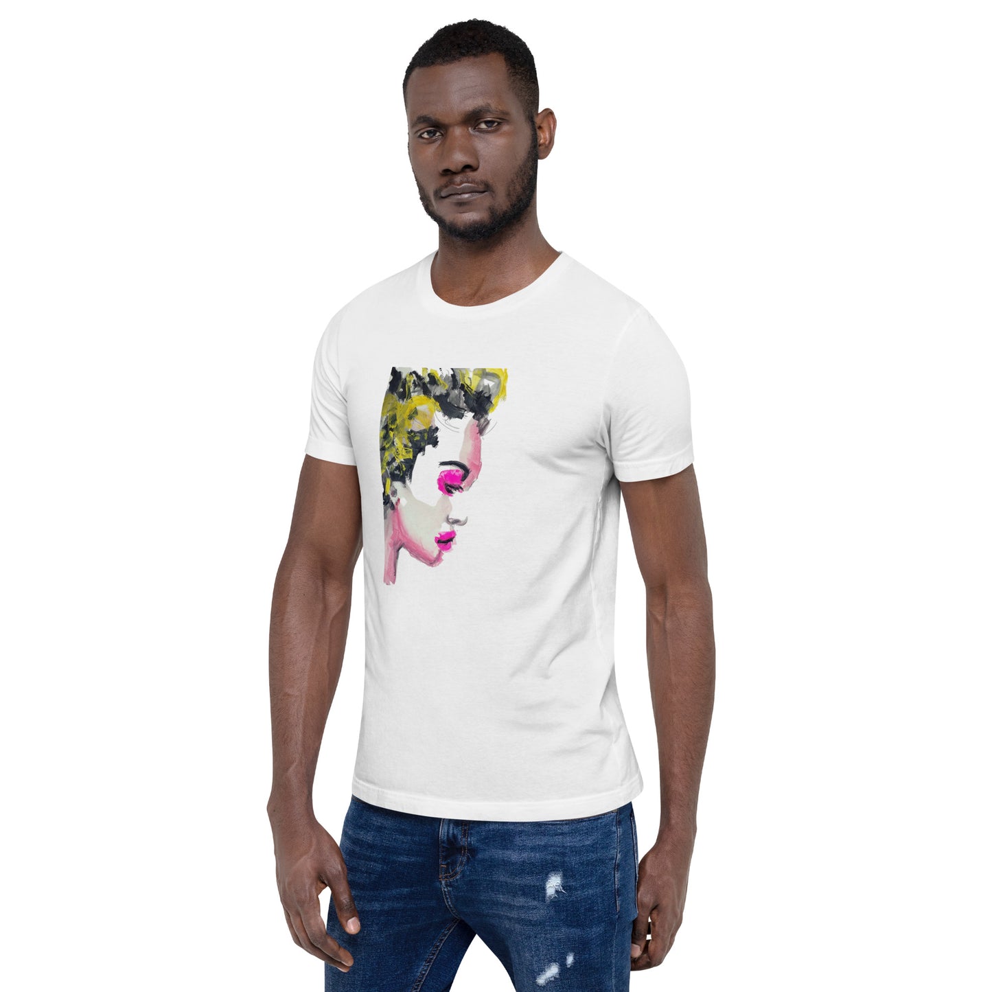 Man wearing a t-shirt with a vivid yellow and pink abstract face – radiant expression – by Ilaria Berenice.