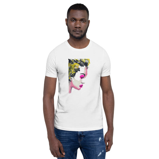 Man wearing a t-shirt with a vivid yellow and pink abstract face – radiant expression – by Ilaria Berenice.