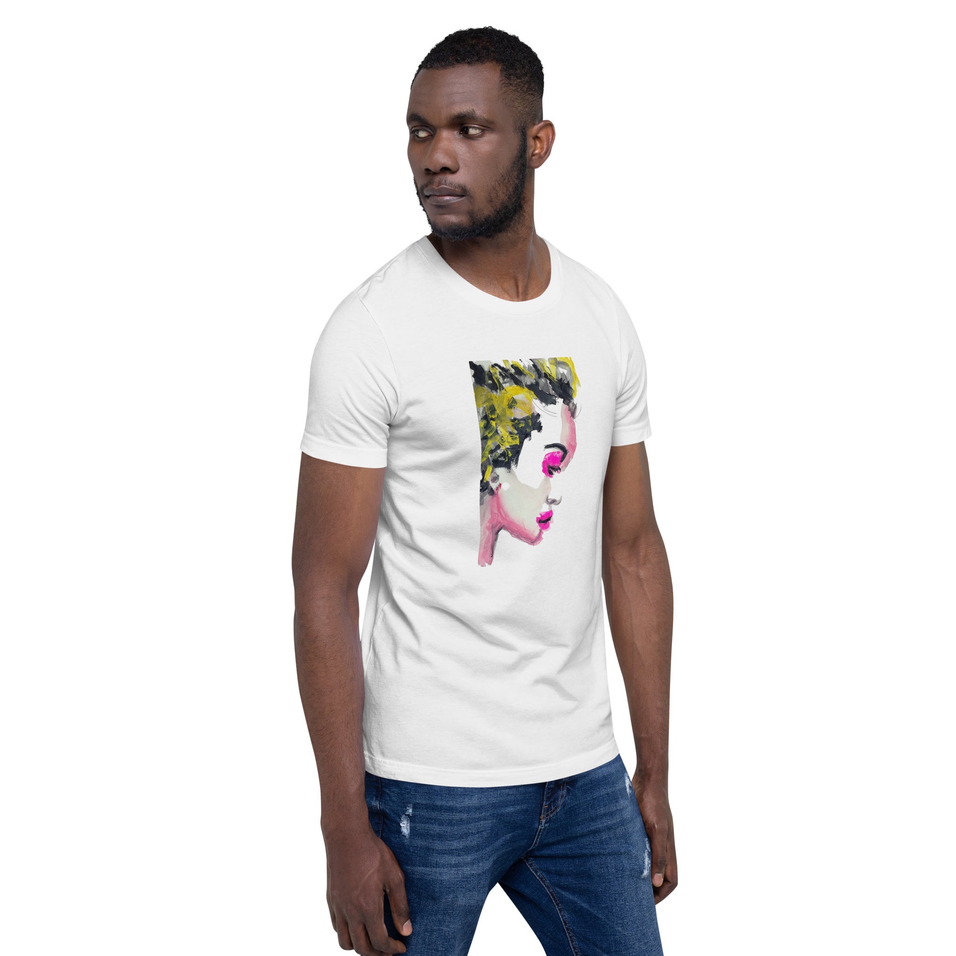 Man wearing a t-shirt with a vivid yellow and pink abstract face – radiant expression – by Ilaria Berenice.
